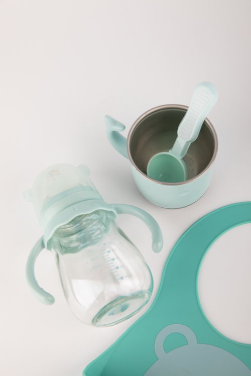 綠色健康兒童用品母嬰用品攝影圖 st攝影